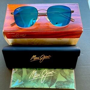 Maui Jim crater rim sunglasses. Brand new in box. Never worn.